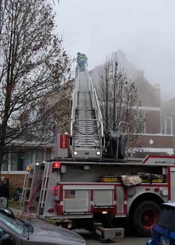 Home Fire 3700 block south honore fireman on ladder 20180102