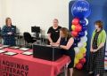 aquinas literacy center honor society georgina garcia signs