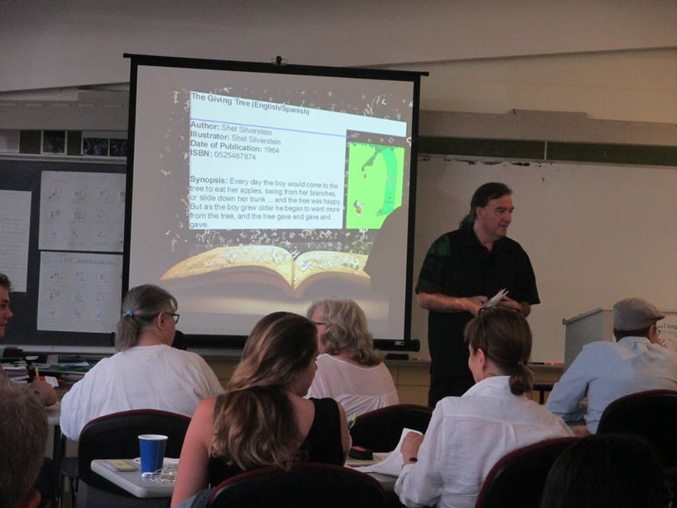 Michael Matos of Literacy Works and Albany Park Community Center leads in-service for returning tutors at Aquinas Literacy Center.