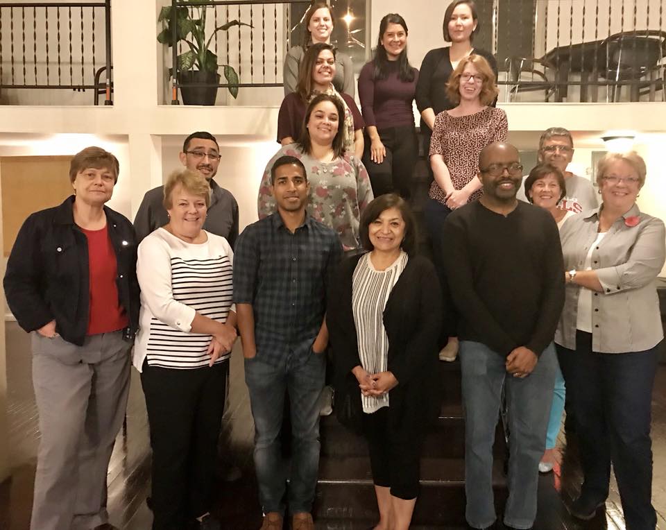 The Aquinas Literacy Center's newest tutors stand ready to provide English literacy training.