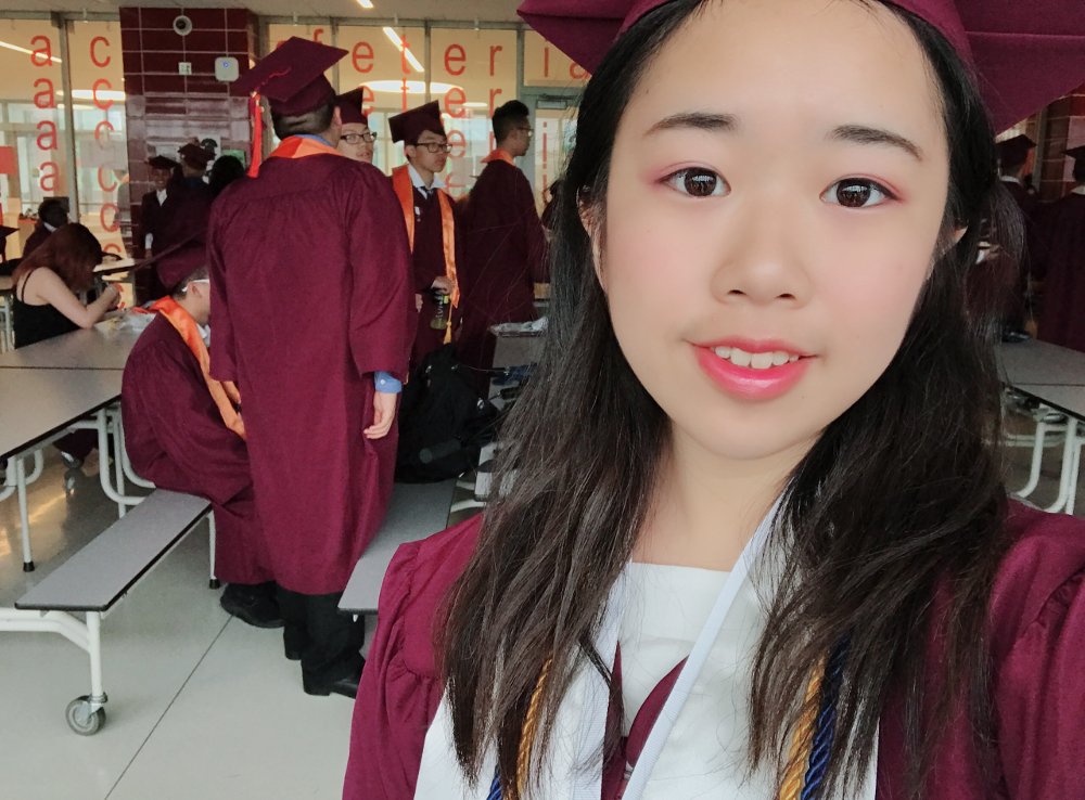 Local high school graduate Amy Wu celebrates her matriculation and pending study at the University of Illinois at Urbana-Champaign’s engineering program.