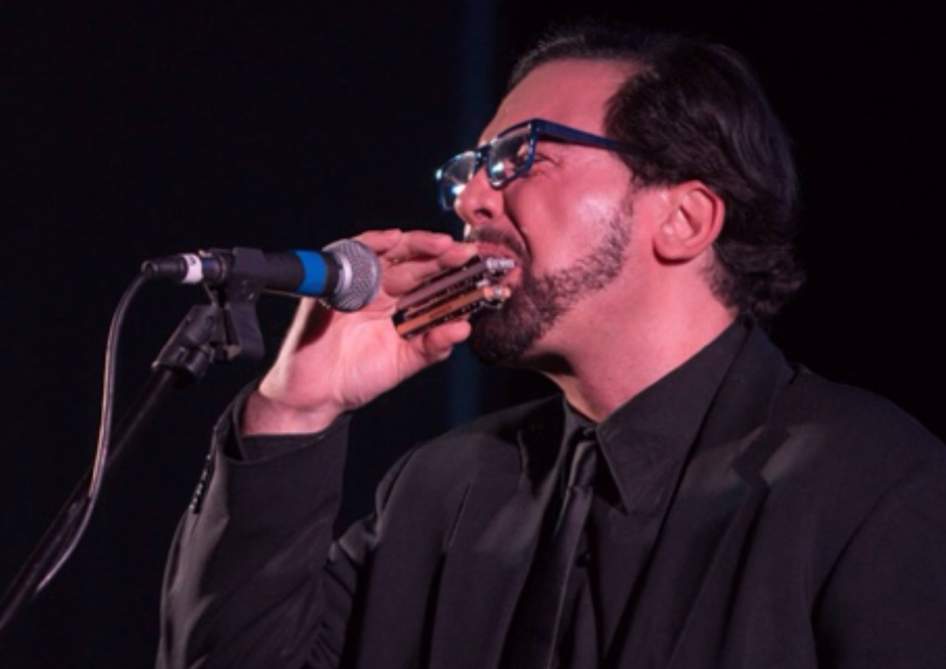 David Kachalon, who will be leading a harmonica workshop (with free harmonica giveaways) at 6:15 p.m. on Thursday, June 21, at Make Music Chicago in McKinley Park, blows into his harp at a past performance.