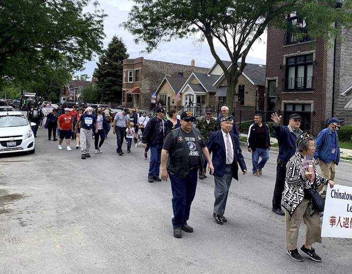 Veterans and neighbors march in the McKinley Park Memorial Day parade on Monday, May 31, 2021, through the McKinley Park neighborhood of Chicago.