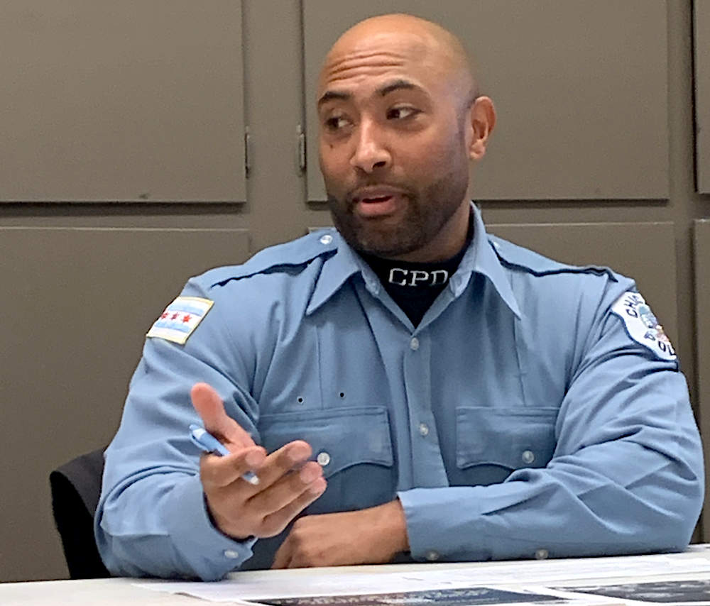 Chicago Police Department Officer John Matich speaks at the community policing meeting for Beat 912 on March 13, 2024.