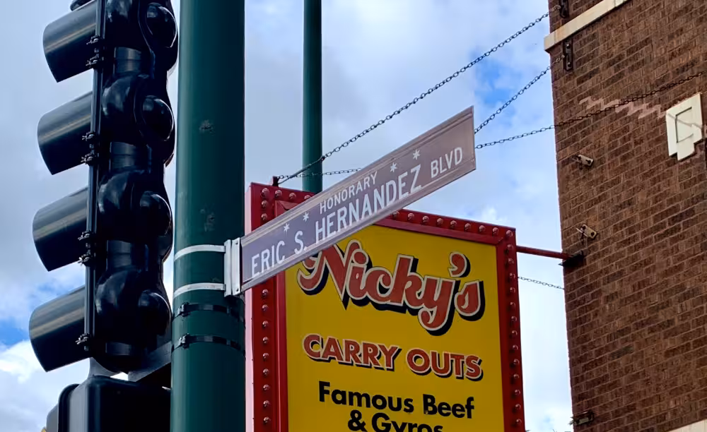 The Honorary Eric S. Hernandez street sign re-designates South Western Boulevard at West 35th Street.
