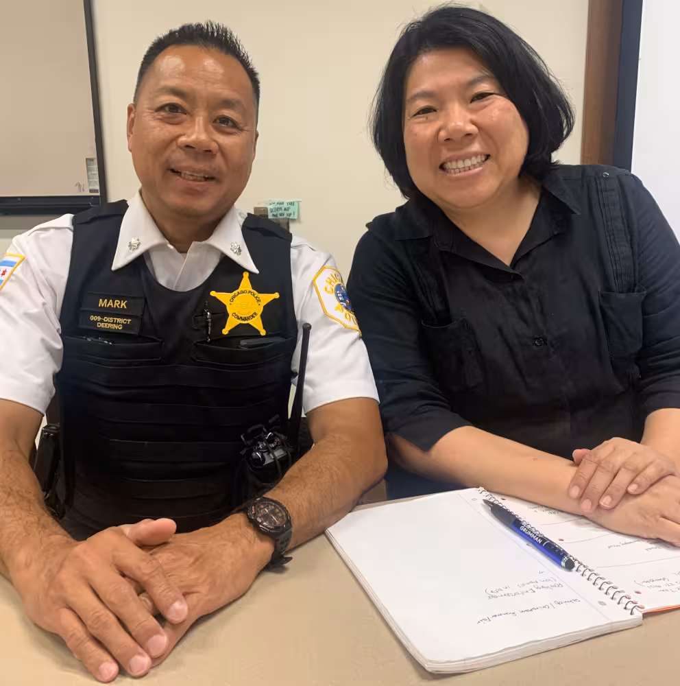 Chicago Police Department 9th District Commander Joseph Mark joins 11th Ward Alderwoman Nicole Lee at the ward meeting on Monday, July 29, 2024, at the McKinley Park public library.