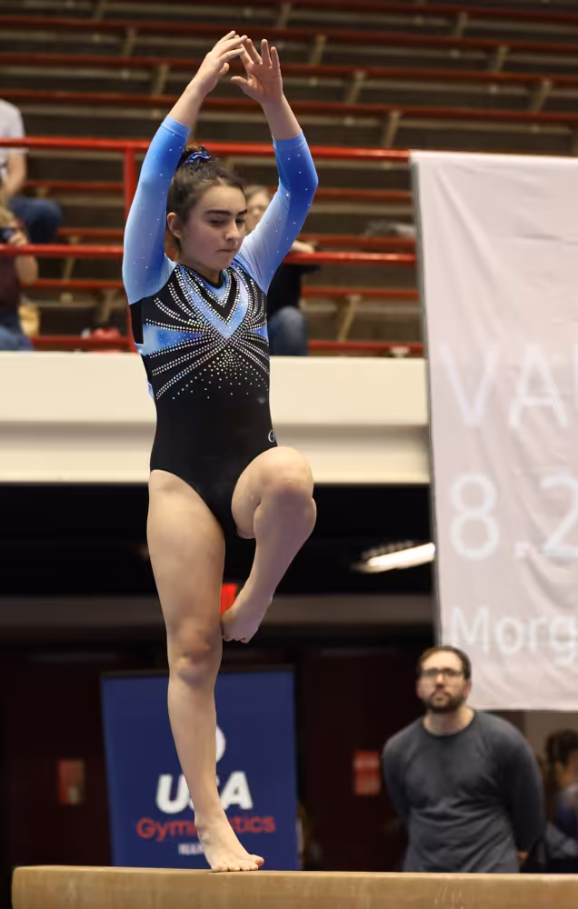 Azaila Terrazas competes on the balance beam at the 2025 Illinois Xcel State Championships.