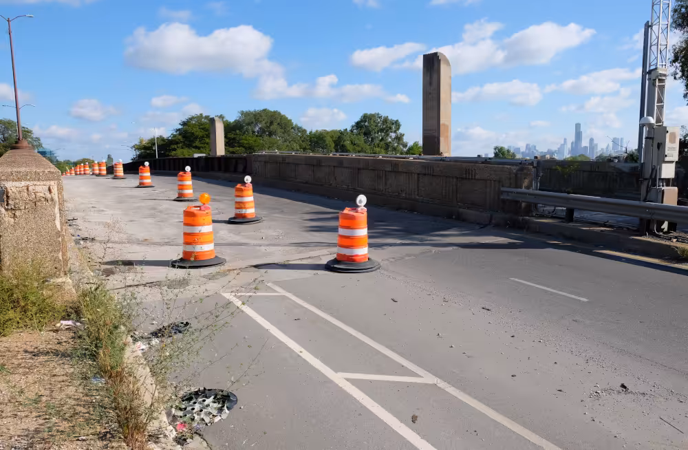 Potholes and closed lanes persist on the South Western Avenue bridge over the Chicago Sanitary and Ship Canal.