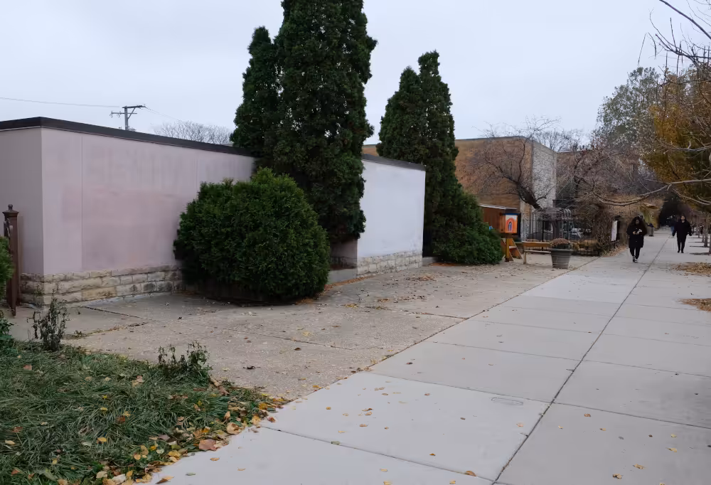 The former school lunchroom at the St. Maurice church property, in foreground, rests on South Hoyne Avenue alongside Velma Thomas Early Childhood Center.