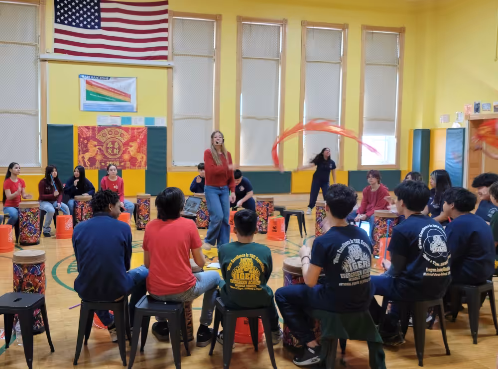 Evergreen Academy students practice their drumming in preparation for the dragon dance.