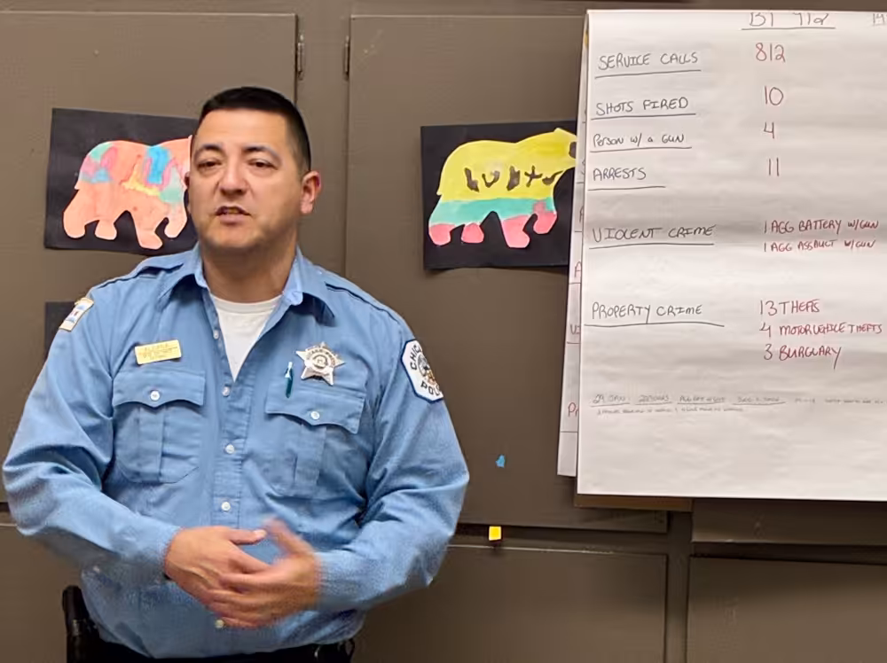Community Policing Officer Carlos Aldana provides updates on McKinley Park neighborhood crime reports at the CAPS Meeting for Beat 912 on Wednesday, February 11, 2026.