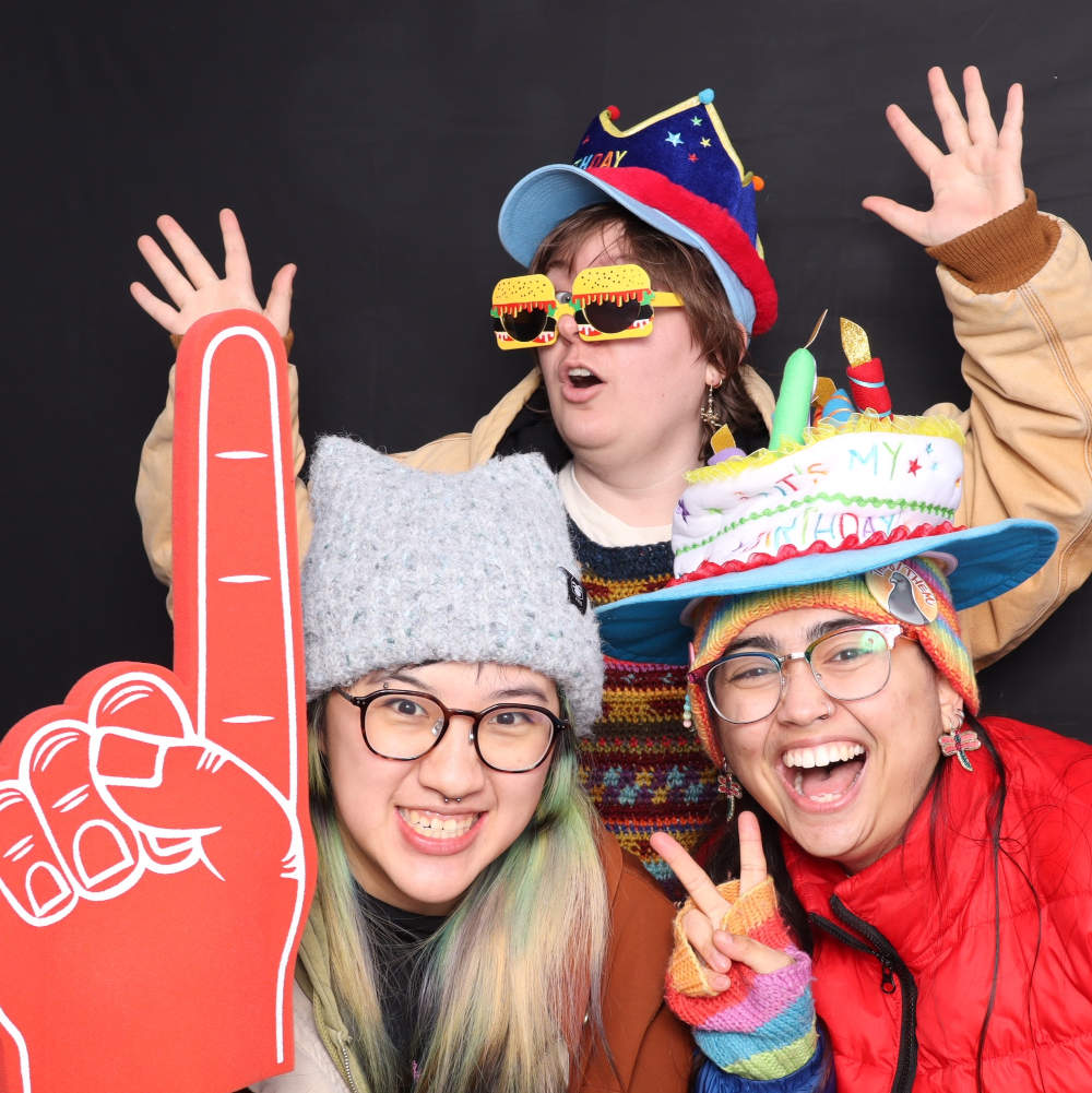 Neighbors pose at the free photo booth at Chicago's Birthday Party on March 4, 2026.