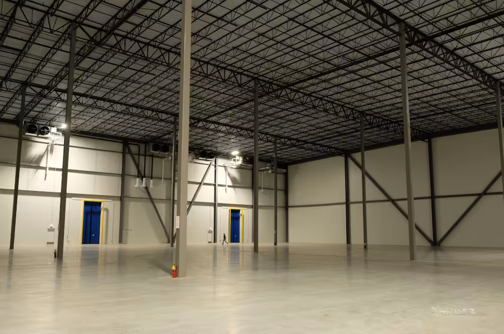The cavernous north freezer of the new Karis Cold storage facility dwarfs property management consultant Maurice Woods.
