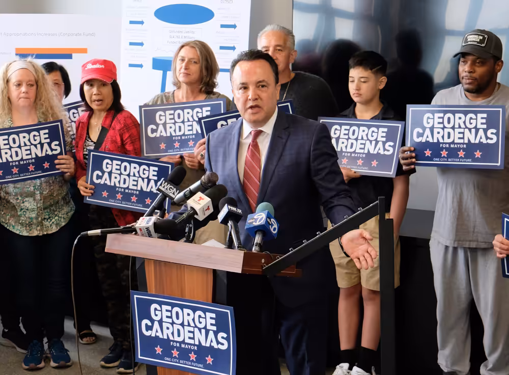 George Cardenas announces his campaign for mayor of the City of Chicago from the podium of New Star Lighting on June 16, 2026.